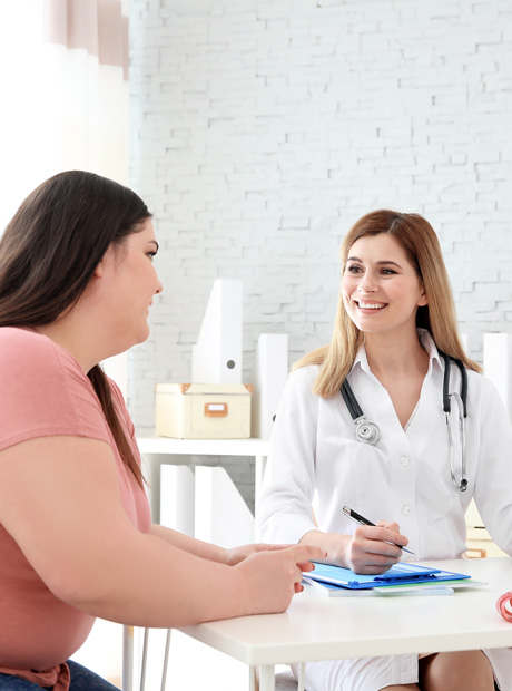 Paciente consultando con profesional de salud